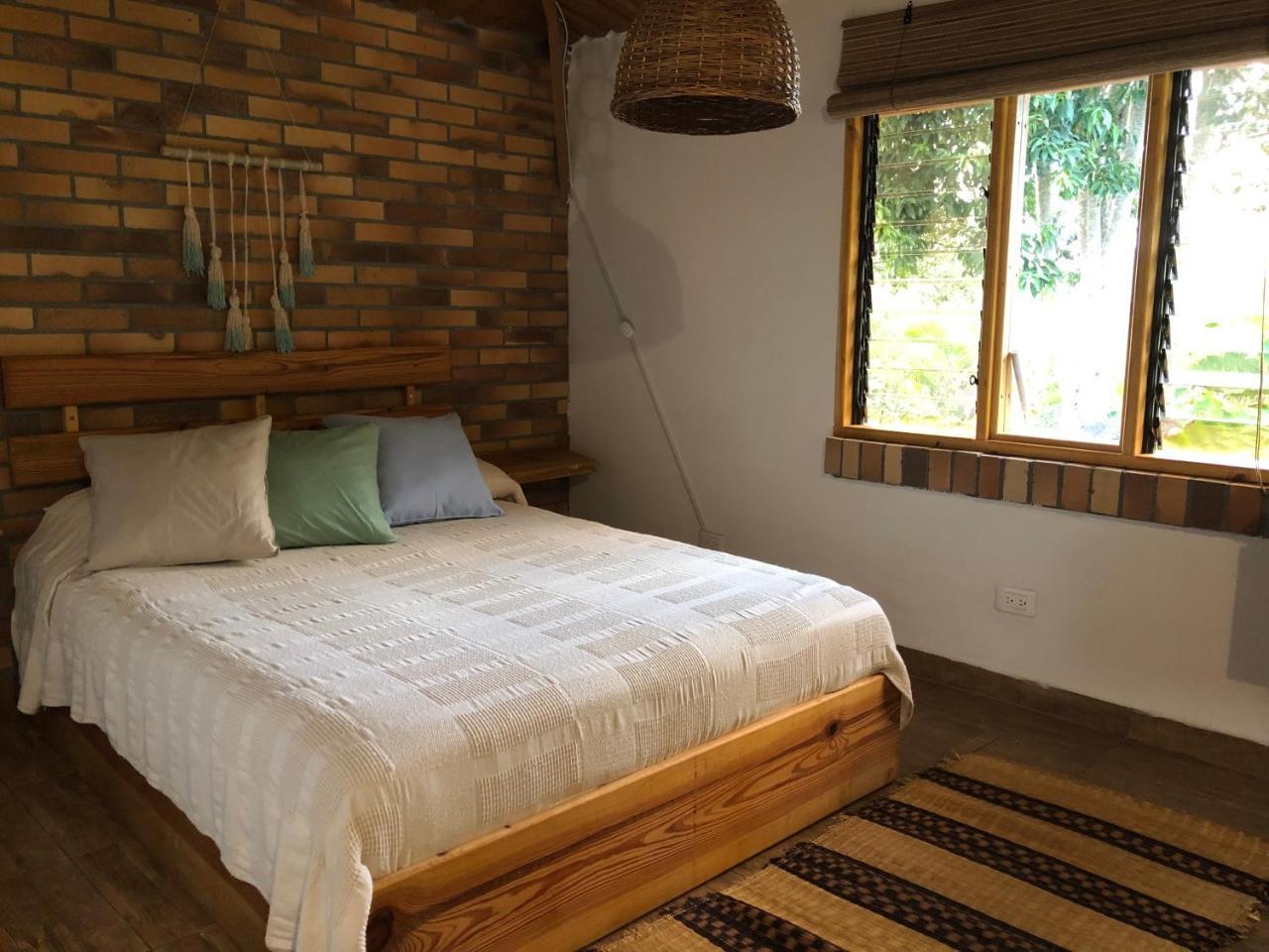 Tribu Ecohostal Лос-Сантос Экстерьер фото